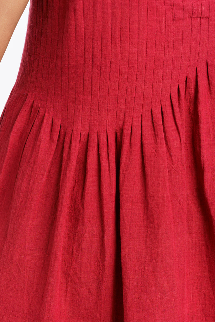 Red pleated midi dress, responsible clothing brands, sustainable India clothing brands, India made organic clothing, best organic and sustainable clothing brands, cotton clothing store near me, lightweight cotton women's clothing, cotton on women's pants, earthy women's clothes, minimalist clothing list women's, minimalist dress